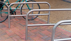 Double steel ground fixed bicycle secure stands.