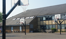 Outdoor playground basketball multi play area installation.