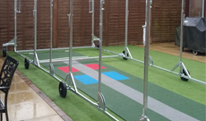 Installation of an artificial non turf practice cricket pitch.