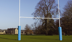 Steel hinged folding rugby posts.