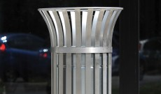 Public open top stainless steel litter bin.