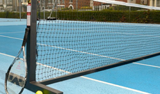 Freestanding mobile tennis posts with optional wheels.