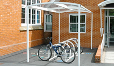 Budget single canopy bicycle storage shelter.
