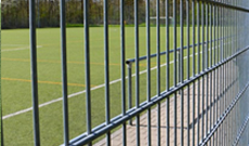 Custom and standard tennis court fencing.