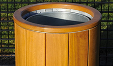Natural timber open ground fixed use litter bin.