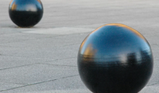 A cast iron dockyard vehicle access bollard.