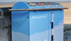 Branded outdoor public litter bins.