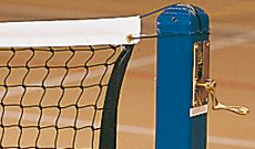 Floor pinned indoor tennis posts with net winder.