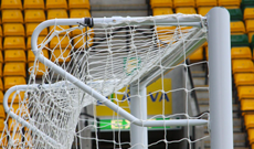 Stadium 3G steel tubular net elbow supports.