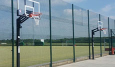 In ground outdoor baketball practice area.