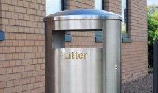 Public dunbar stainless steel litter bin.