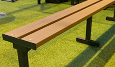 Steel and timber freestanding players sideline bench.