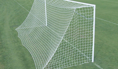 Pair of steel 7.32m x 2.44m ground socketed goalposts.