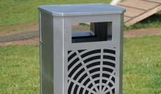 Public open top stainless steel litter bin.